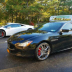 Black Maserati and White Lamborghini with Clean Image truck.