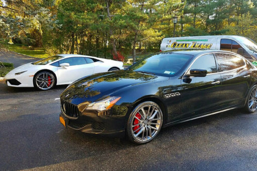 Black Maserati and White Lamborghini with Clean Image truck.