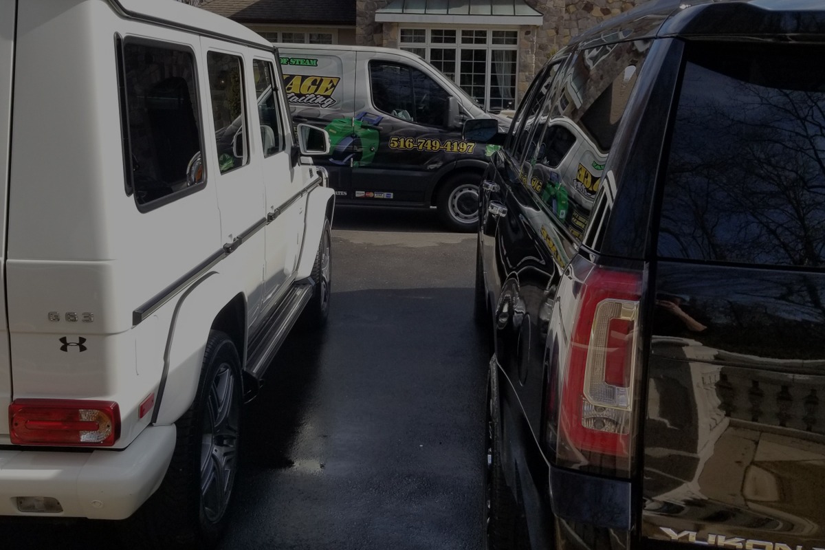 White Mercedes G63 and Chevy Yukon in black cleaned.