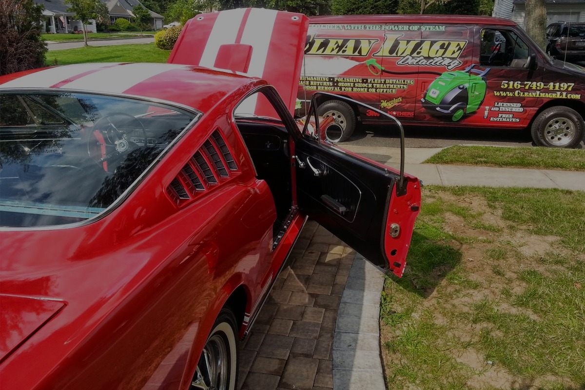 Red Mustang Fastback with Clean Image Detailing truck.