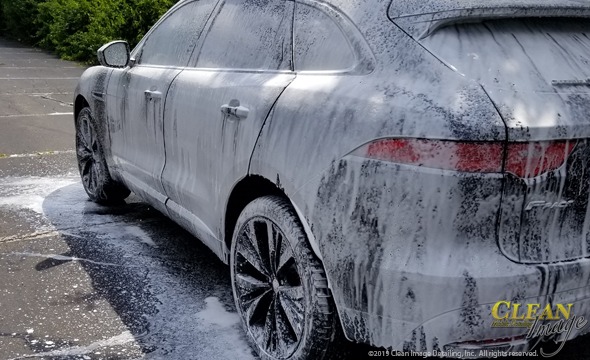 Black Jaguar F-Pace truck foam bath.