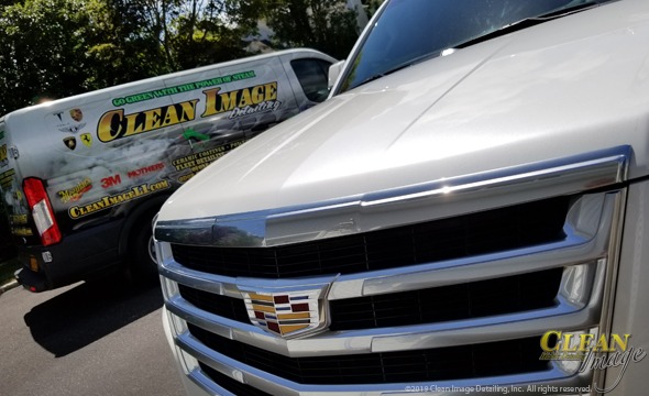 Cadillac Escalade in silver front Grille.