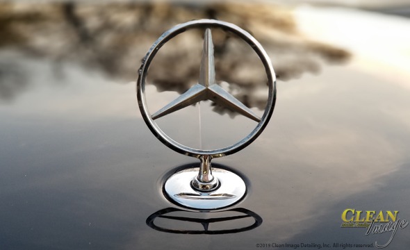 Mobile Detailing: Mercedes logo on black 5 series.