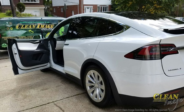 Mobile Detailing: White Tesla Model X after full detailing service.