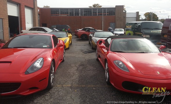 Mobile Detailing: Group of differently colored Ferrari sports cars after fresh detailing.