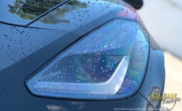 Black Corvette driver's side headlight.