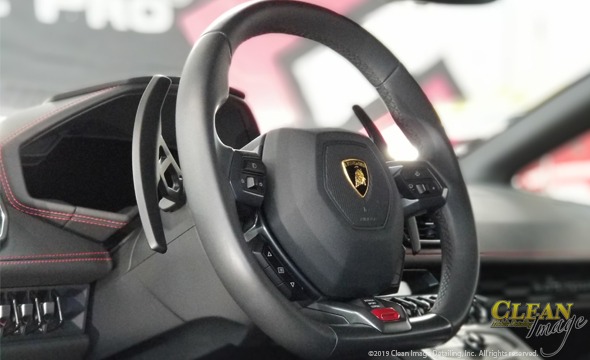 Ferrari steering wheel and interior.
