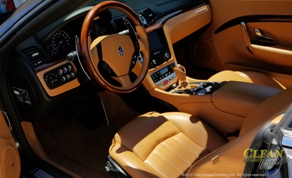 Black and tan Maserati interior all clean.
