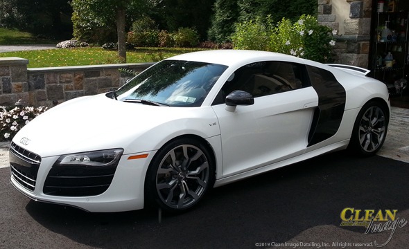 White and black Audi R8 after full detailing.