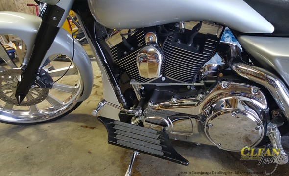 Silver custom Chopper with tons of clean chrome accents.