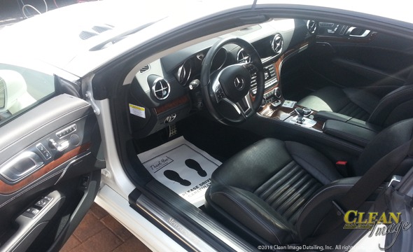 White Mercedes SL550 AMG all cleaned black interior.