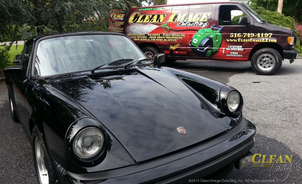 Black Porsche 911 dripping in gloss after a fresh cleaning!
