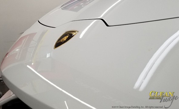 White Lamborghini hood perfectly shining.