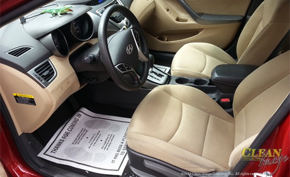 Red Hyundai with tan interior all cleaned.