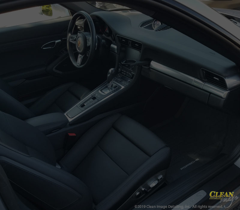 Mobile Detailing: White Porsche 911 steam clean and odor removal.