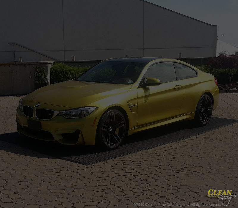 Gold BMW M3 after paint correction services.