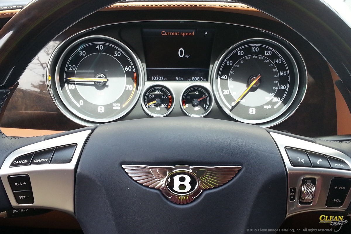 Bentley steering cluster after interior detailing.